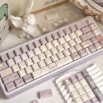 Gallery view of Magic Poetry Dreamscape Side-Printed Backlit Magic Keycap set , revealing their enchanting ethereal light purple glow and mystical.