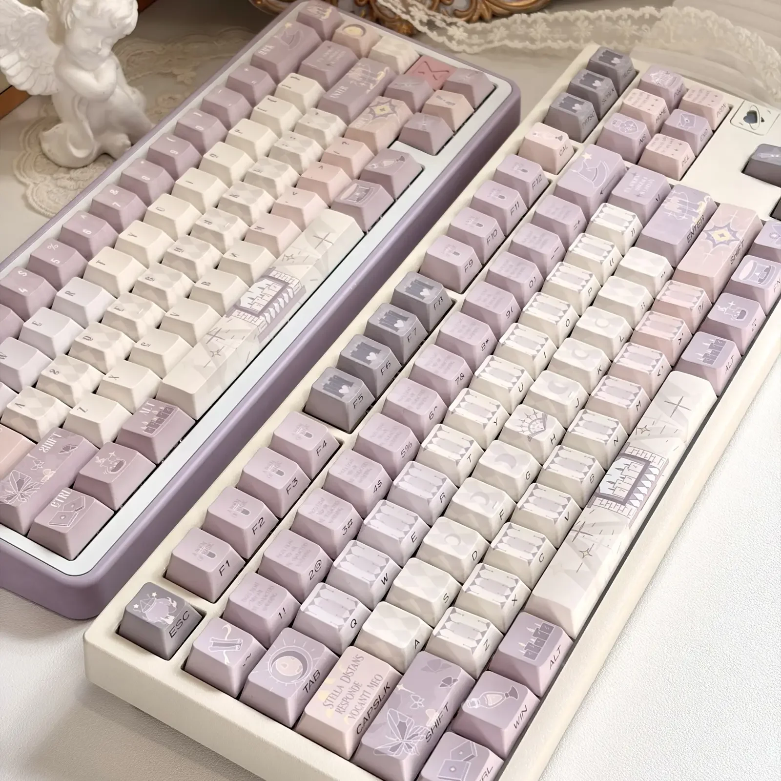 A collection of Magic Poetry Dreamscape Side-Printed Backlit Magic Keycap set, showcasing their ethereal light purple glow and mystical side-printed.