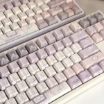 Detailed views of Magic Poetry Dreamscape Side-Printed Backlit Keycap set highlight their ethereal light purple glow, mystical legends, and Cherry profile.