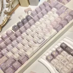Magic Poetry Dreamscape side-printed backlit magic keycap set glowing with ethereal light purple, revealing mystical legends for a poetic fantasy design.