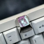 Exquisite hand-carved Makima titanium keycap for Chainsaw Man fans, showcasing elegant line art on a premium alloy surface.