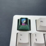 Premium titanium Maomao ESC keycap featuring the vibrant anime cat motif from The Apothecary Diaries, exuding fantasy charm.