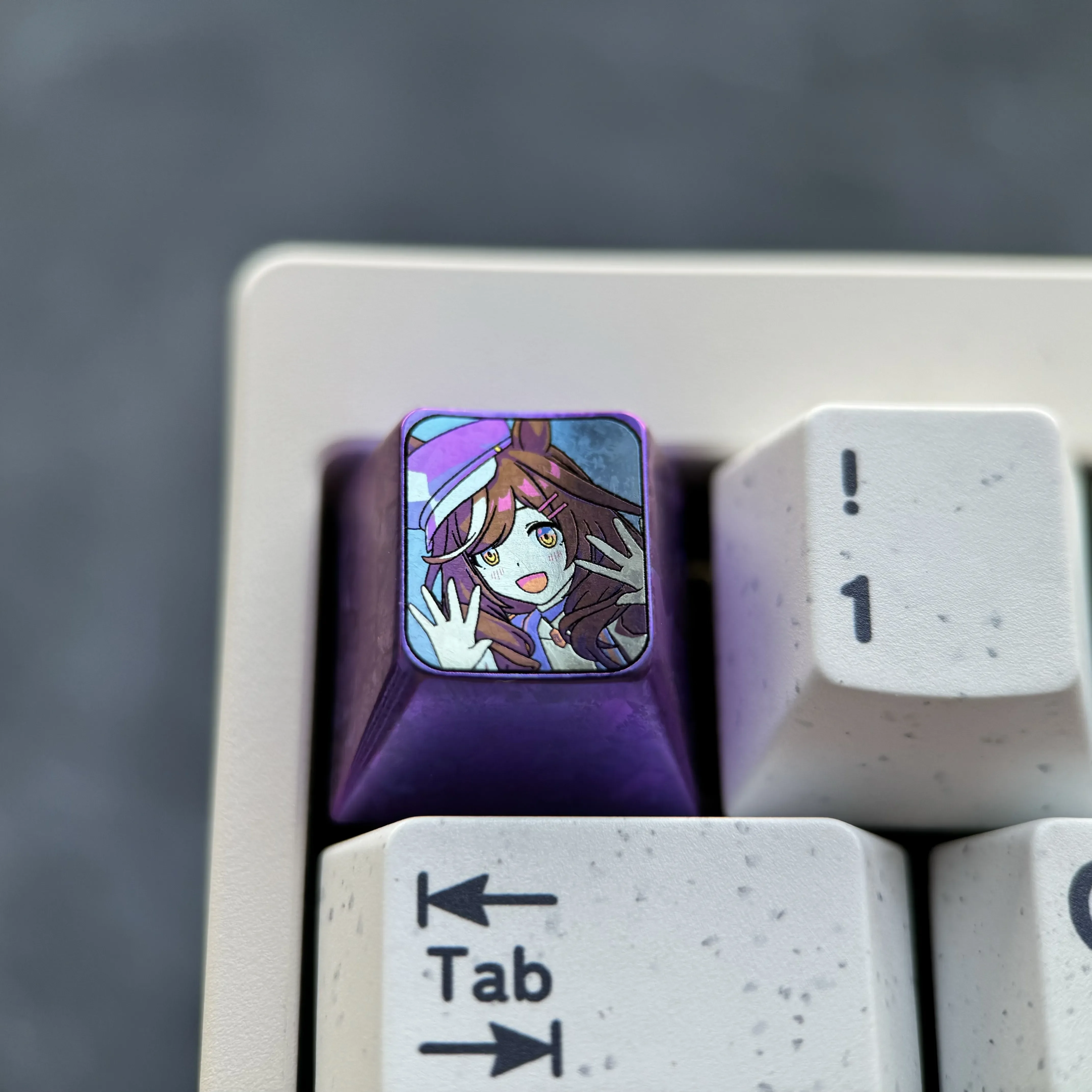 Showcasing multiple angles of the elegant Matikanetannhauser artisan anime keycap. This premium titanium ESC keycap features intricate Uma Musume Pretty Derby.