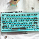 Ainbell Base99 mint chocolate tri-mode hot-swappable mechanical keyboard from multiple angles, highlighting its elegant design and premium features.