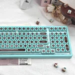 Ainbell Base99 Mint Chocolate Tri-Mode Hot-Swappable Mechanical Keyboard: elegant gallery highlights its fresh aesthetic and premium design.