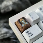 Dynamic views of the premium Titanium Misaka Mikoto keycap, showcasing its vibrant anime character art and exquisite metallic craftsmanship.
