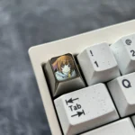 Sengoku Nadeko art keycap, an iconic chocolate-colored premium metal piece, perfect for collectors of unique art keycaps.