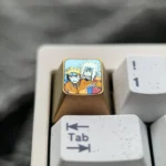 Gallery of the iconic Naruto & Jiraiya titanium art keycap, showcasing vivid, intricate anime sculpture in polished titanium. Legendary Naruto spirit.