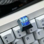 A gallery of Ninja Gaiden: Ryu Hayabusa Keycap views in Ice Crystal Grey, highlighting its sleek metallic finish.