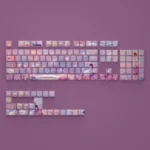 Vibrant Dreamscape Delight oil painting keycaps set on a keyboard, showcasing artistic side-lit legends and whimsical landscape designs.