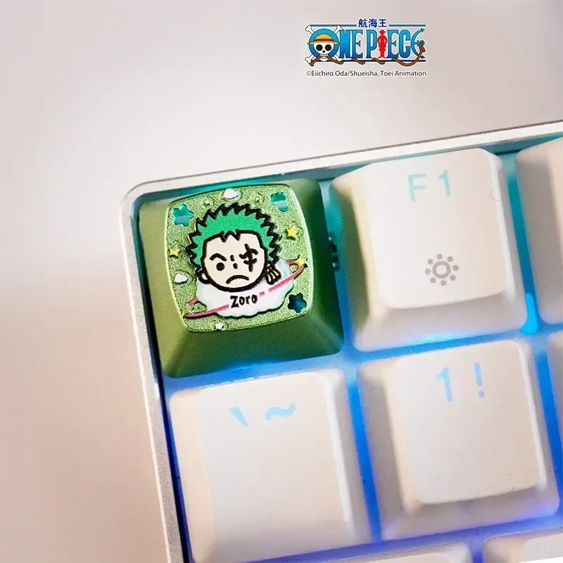 One Piece characters artisan keycap playfully displayed, bringing vibrant anime charm to custom mechanical keyboards.