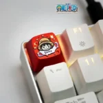 One Piece Characters artisan keycap. A playful, vibrant Luffy keycap bringing anime charm to your mechanical keyboard.