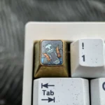 Vibrant premium titanium ONE PIECE keycap for mechanical keyboards, showcasing intricate One Piece character design and superior craftsmanship.