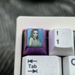 Stunning display of the premium titanium ONE PIECE artisan keycap, highlighting its intricate metal craftsmanship and vibrant, iconic One Piece character design.