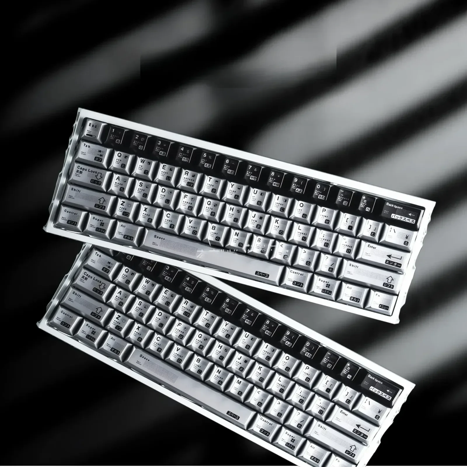 Sleek silver-black Parametric Keycap set, showcasing its unique algorithmic metallic electroplated design and geometric precision for custom keyboard.