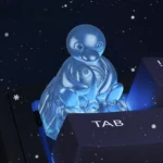 Whimsical handcrafted Pingu Ice Sculpture ESC Keycap. Sculpted from translucent resin, this delightful Pingu keycap charmingly mimics an ice figurine.