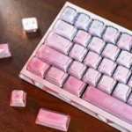 A product gallery of Celestial Pink Gradient Keycaps Set, showcasing the dreamy dye-sub PBT texture and vibrant backlit legends from multiple angles.