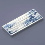 Gallery of exquisite Blue & White Porcelain PBT keycaps set. Multiple angles reveal intricate classical motifs, serene Jiangnan landscapes, unique design.