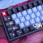 Multiple views of Rabbit Hole Keycaps Set, revealing enchanting side-printed PBT legends with whimsical VOCALOID backlit aesthetic.