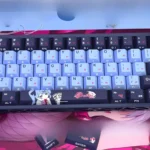 Rabbit Hole Keycaps Set with enchanting side-printed PBT legends on a whimsical compact backlit keyboard, showcasing Hatsune Miku aesthetics.
