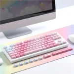 Vibrant Rainbow Keycaps Set in MOA profile PBT dye-sub, displayed from multiple dynamic angles, emphasizing the joyful spectrum of neon colors.