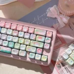 Artistic Raspberry Ice Whimsy PBT Dye-Sub Keycap Set. Premium keycaps with pastel pink, creamy white, and berry dessert aesthetics for mechanical keyboard.