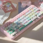 Raspberry Ice Whimsy PBT Keycap Set for mechanical keyboards, showcasing whimsical pastel pinks, creamy whites, and hand-drawn dessert aesthetic design.