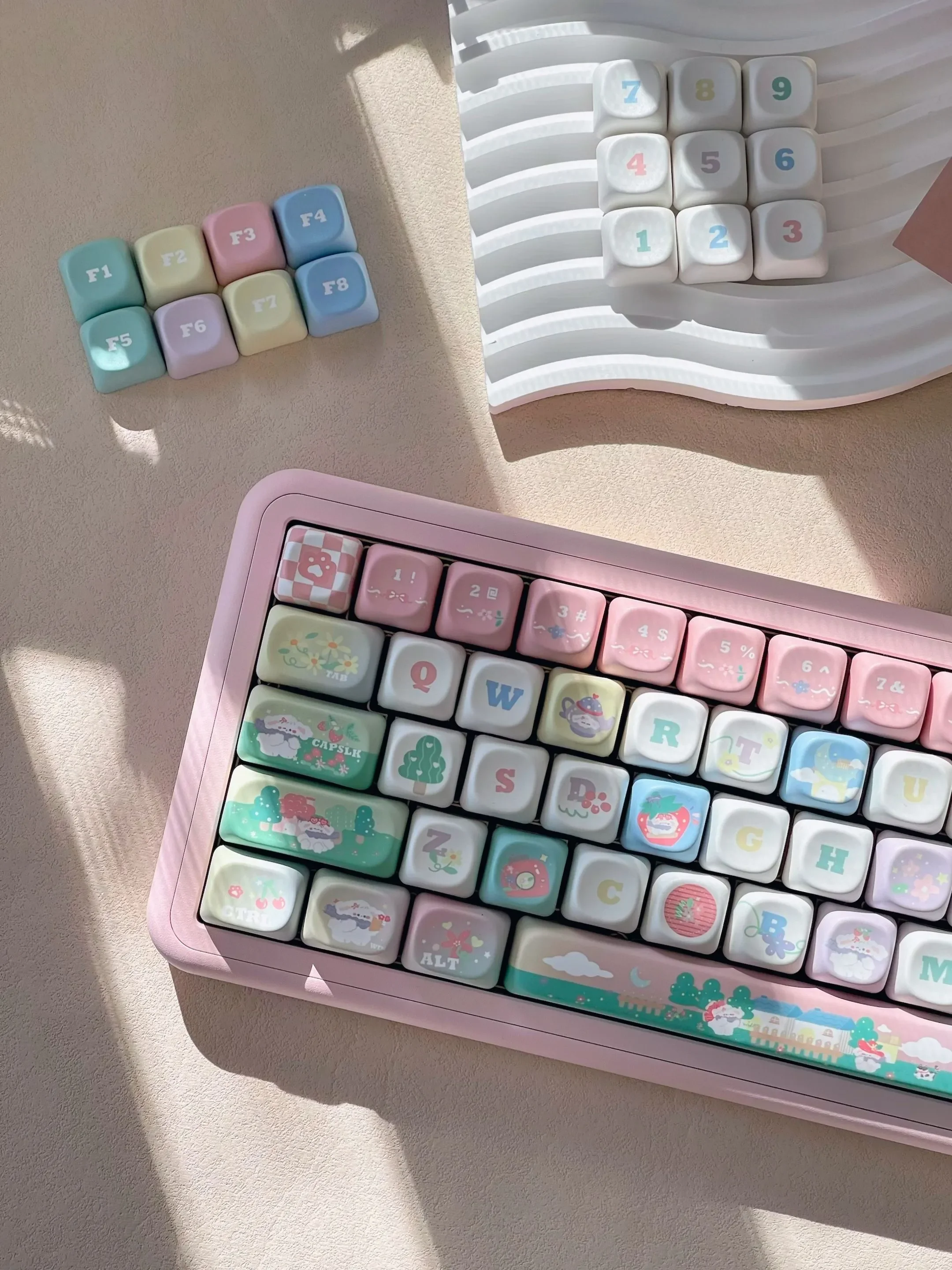Raspberry Ice Whimsy PBT Dye-Sub Keycap Set. Showcases premium PBT, unique pastel pink, creamy white dessert theme, and hand-drawn berry accents.