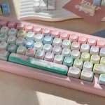 Raspberry Ice Whimsy PBT Dye-Sub Keycap Set. Artistic pastel pink & creamy white dessert theme with berry accents. Premium keycaps.