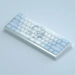 Artistic gallery showcasing exclusive Re:Zero Rem keycaps set from various angles, highlighting vibrant side-engraved backlit legends.