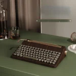 Vintage QL75 mechanical keyboard in a retro design, highlighting elegant enamel-like keycaps and hot-swappable tri-mode design.