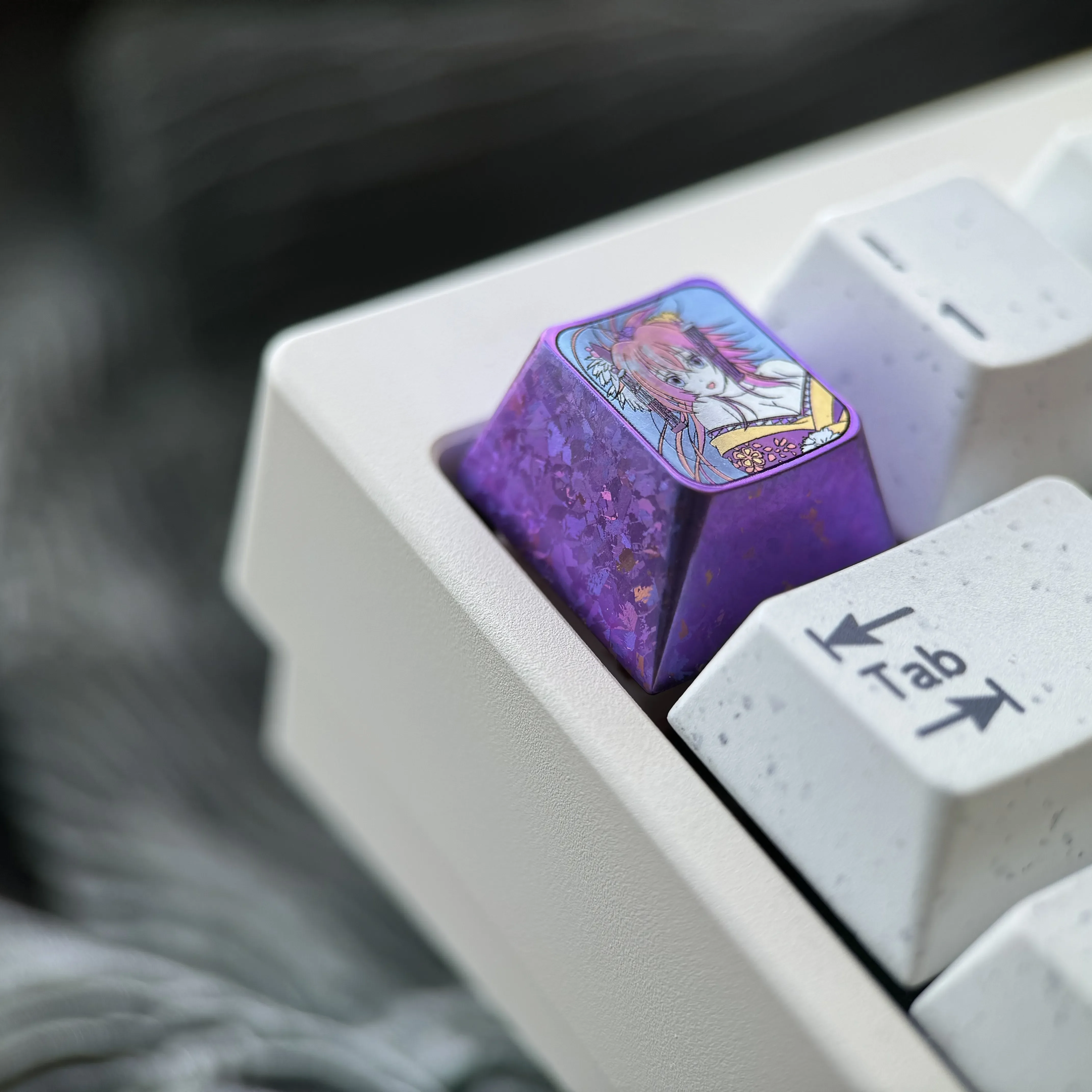 Product gallery of the Exclusive Rias Gremory Titanium Artisan Keycap, showcasing its vibrant anime sculpture and captivating purple ice crystal.