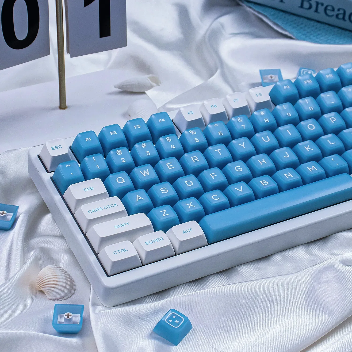 Multiple angles of the playful SA Profile Keycaps Set, showcasing the Sea Salt Ice Cream Delights cool pastel art design.
