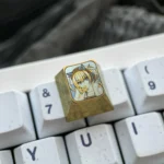 Dynamic gallery views of the Shirayuki Noa Titanium Keycap, accentuating its vibrant orange crystalline texture and iconic anime character artistry for the ESC key.