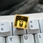 Artistic gallery showcasing the durable Shirayuki Noa titanium keycap with vibrant orange crystalline texture and iconic anime character art.