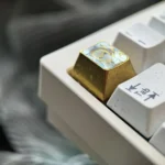 Vibrant Shirayuki Noa titanium keycap gallery, showcasing iconic anime character art from various angles, emphasizing durability and artistic feel.