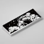 A collection of Spirited Away side-lit Cherry profile keycaps set showcasing iconic Ghibli characters from various angles, capturing a dreamy artistic touch.