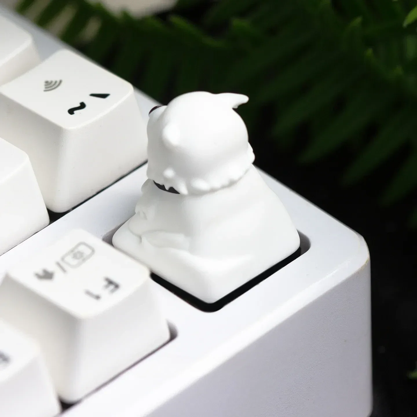 A gallery showcasing the handcrafted Spy x Family Bond Forger artisan keycap from multiple angles, highlighting its charming, detailed resin.