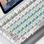 Vibrant Summer Festival keycap Set. Durable, dye-sublimated 131-key set showcasing charming anime motifs from various angles.