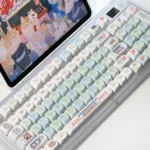 Various angles of the vibrant Summer Festival keycap Set, showcasing durable PBT construction and charming anime dye-sublimated art.