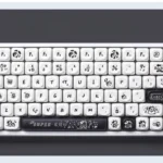 Whimsical Super Cow keycaps set showcasing durable PBT dye-sub MOA profile. A full set with charming black and white cow and farm designs.