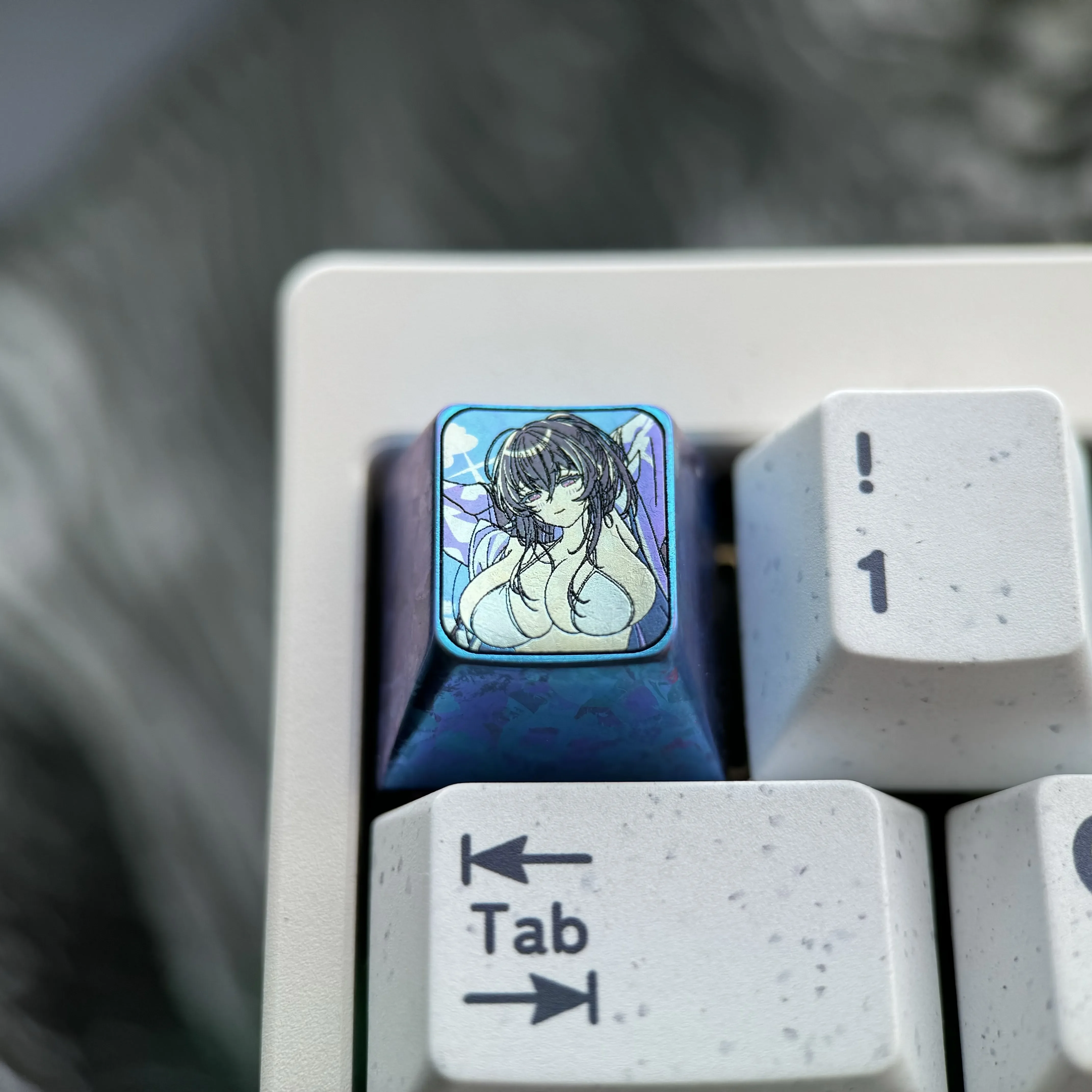 Premium Colored Titanium Azur Lane Taihou Keycap featuring an icy blue metallic finish and detailed character art, perfect for custom gaming setups.
