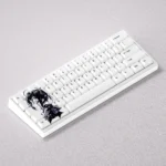 A collection of Takanashi Rikka anime keycaps set showcasing their vibrant colors, signature motifs, and shine-through features from various angles.