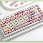 Delightful Taro Mochi Keycaps Set. Unique double-shot SOA profile keycaps in soft pastel purples and creams, evoking sweet dessert aesthetics.