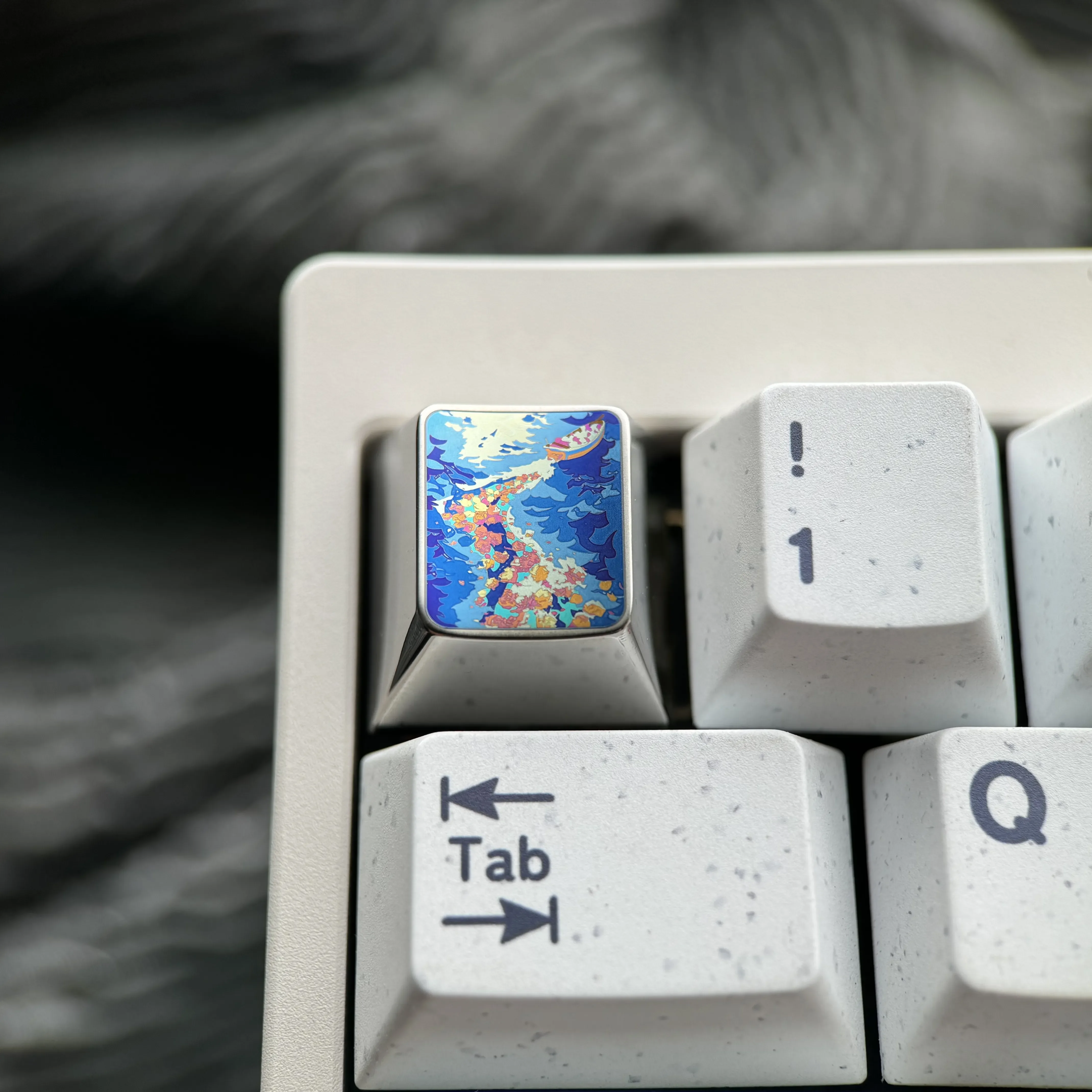 Vibrant Anime Titanium Wave Keycap from multiple angles, showcasing the premium metallic finish and dynamic ocean wave design.