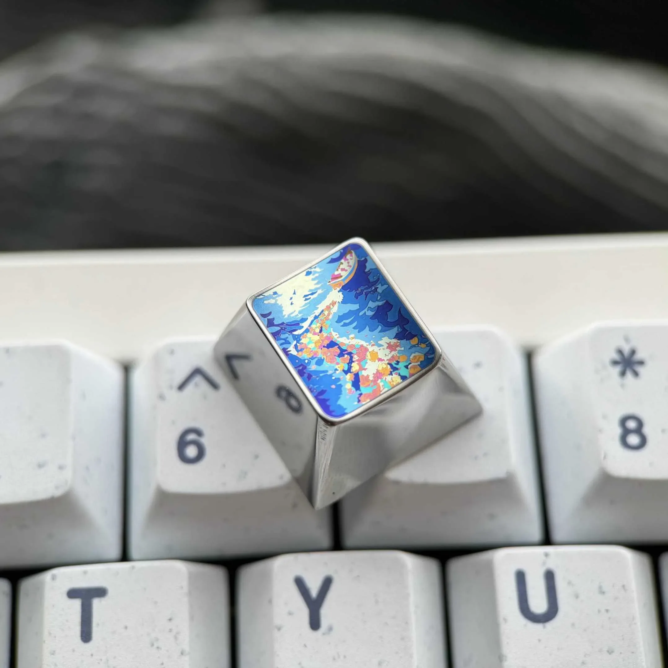Vibrant Anime Titanium Wave Keycap collection, showcasing its premium metallic finish and dynamic ocean-inspired design from various artistic angles.