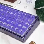 Violet Amber Keyboard gallery, showcasing mystical three-layer amber craft keycaps. Translucent deep violet meets warm amber for a stylish workspace.