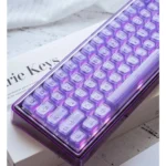 Violet Amber Keyboard with mystical three-layer amber craft keycaps, revealing translucent deep violet and warm amber layers.