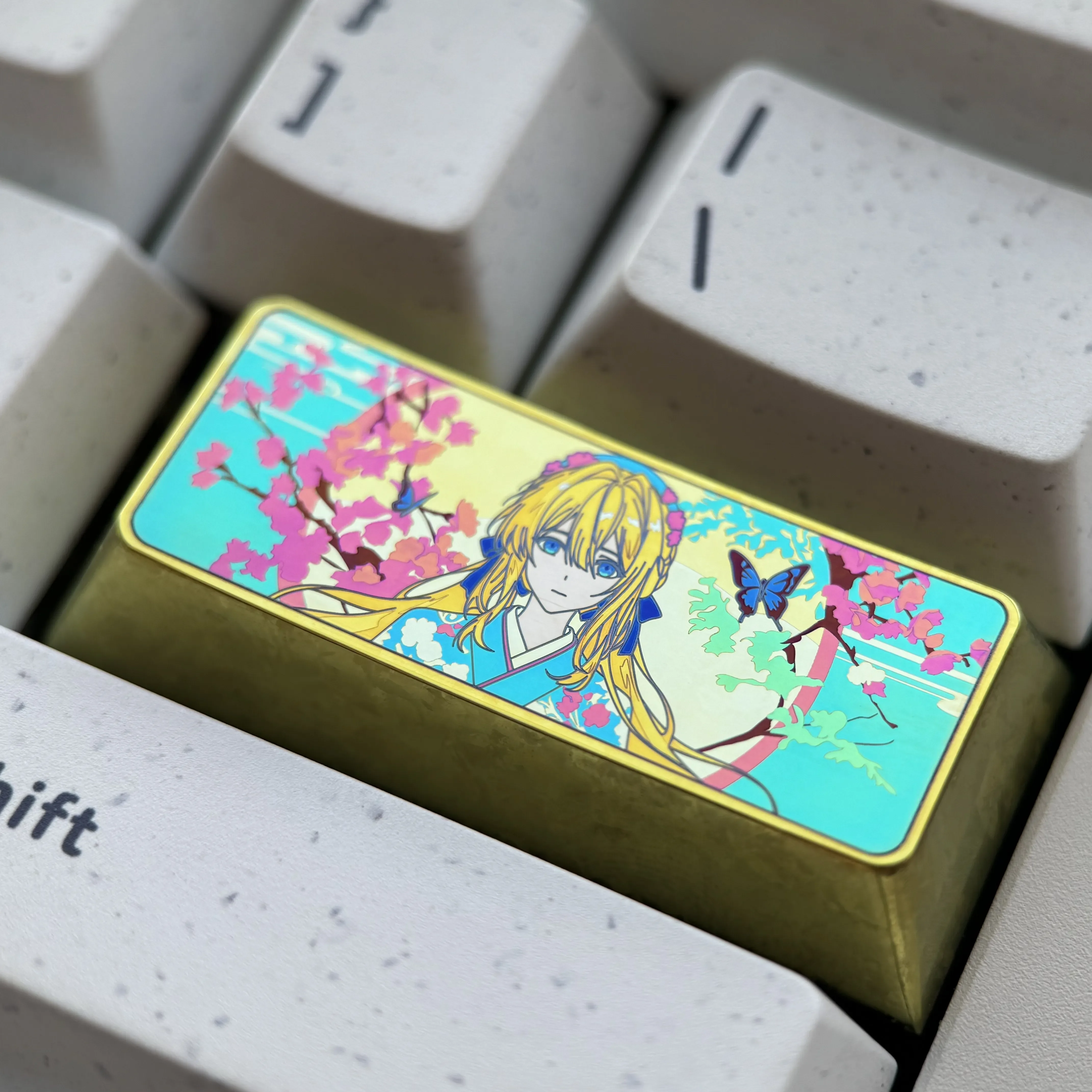 Handcrafted custom Violet Evergarden keycap made from exquisite titanium alloy, displaying elegant anime art with vibrant metallic details.