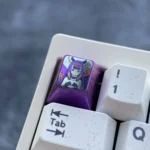 Vibrant Virtual YouTuber: Ninomae Ina'Nis Keycaps shown from various angles, highlighting its rich purple metallic luster and sleek modern, handcrafted design.